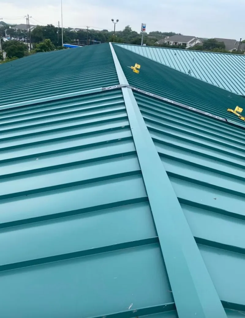Green commercial metal roof ridge and valley for Metal Roof Repair in Signal Hill